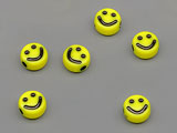 Мънисто жълто с усмивка d=6.8mm, дебелина 3.7mm, отвор 1.6mm - 25g ≈ 216 бр.