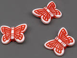 Пеперуда бяло и червено 14x11mm, отвор 1.5mm - 25g ≈ 93 бр.